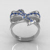 Classic 18 Karat White Gold Round Pave Blue Topaz Stone Ribbon Ring R92-18KWGBT-2